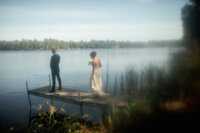 first look for bride and groom on the lake 