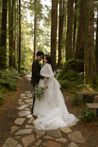 Moody, romantic wedding in the forests of Forks, Washington inspired by Twilight, captured by a luxury wedding photographer with an editorial, cinematic style.