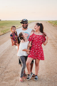 photo of dad and daughters in Fort Lupton Colorado