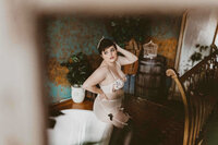 woman in a white lingerie doing a pose