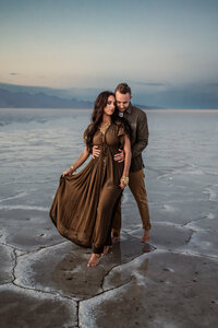 man hugging women from being  at the salt lake flats