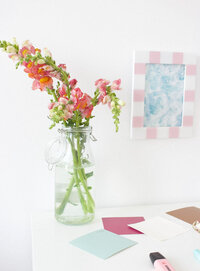 flowres on a brand designer's desk