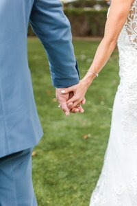 Scottsdale-Wedding-Photographer-and-Videographer-Private-Residence-couple-holding-hands-HuffoWed-1569