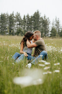spring couples photoshoot in a grassy flower field in Michigan