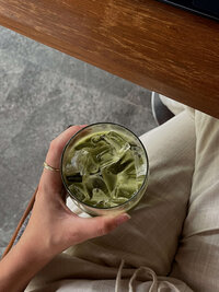 A woman holding her match a in bed