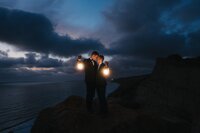 bride and groom with lanterns
