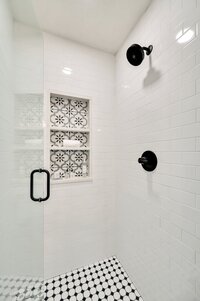 Walk-in shower  in this 3-bedroom, 2-bathroom luxury condo in downtown Waco, TX