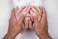 Capturing details of tiny toes and parents hands in Studio Newborn photography Session - Edmonds, Wa