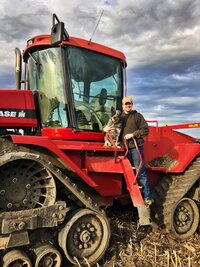 Boy on red tractor