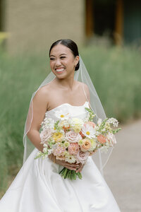 Bride and groom walk up memorial steps at their DC wedding