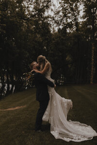 Couple hugging at wedding at Celebrations on the River in La Crosse, Wisconsin