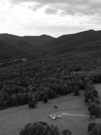 black and white drone image of mountain wedding ceremony in vermont