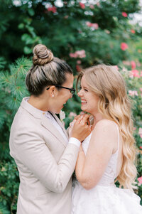 Two brides embracing at LGBT same sex wedding Lancaster, PA