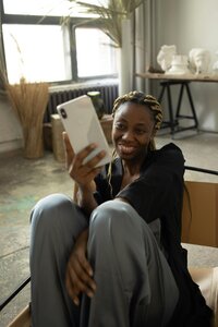 Female looking at phone on video call