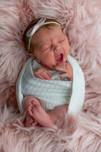 newborn baby girl wrapped photography