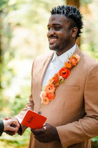 Floral lapel on groom