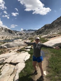 photographer summits mountain range