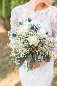 bridal bouquet with sea thistle photographed by charlotte wedding photographers