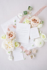 pink and white wedding invitations floral arrangement