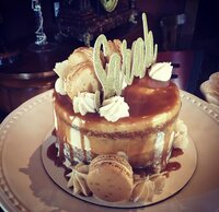 Founder of Grain Artisan Bakery baking gluten-free pastries in her home kitchen in 2016, representing the early word-of-mouth growth that sparked the Snohomish bakery’s success.