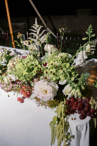 lush reception florals taken with direct flash taken by boston documentary wedding photographer