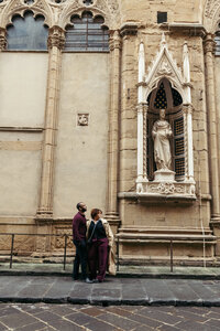 Bride and groom look at each other before cake cutting during the wedding reception at Villa Elena in Bergamo