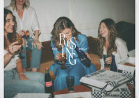 Group of women with Jamie Sea eating pizza