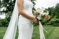 bride holding flowers