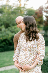 A garden maternity and newborn photography session in Rochester NY
