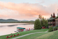 Lake PLacid lodge wedding phoographer with a sunset view overlooking the lake 