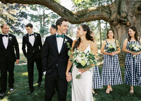 Bride and groom walk up memorial steps at their DC wedding