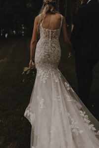 Bride walking away from camera at wedding at Celebrations on the River in La Crosse, Wisconsin