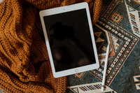ipad sitting on blanket
