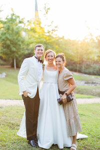 Eleanor Stenner with bride and groom at Birmingham wedding 