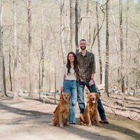 A couple poses during their engagement session at Burke Lake Park, captured by Nathan Sottung Photography.