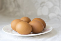 Canva - Five Organic Eggs on Plate