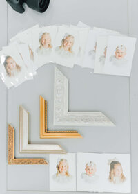 heirloom photos laid out with frames to purchase