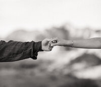 Guy and girl holding hands