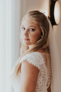 bride looks over shoulder