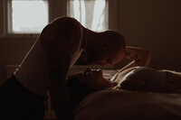 Woman wears lingerie set for Minneapolis boudoir photographer