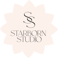 A cream colored multi legged star with black text that  has two 'S's intertwined above the starborn studio logo