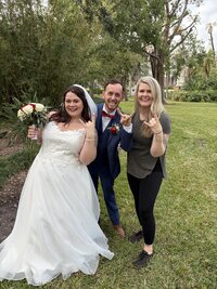 photo of a florida elopement couple with their photographer