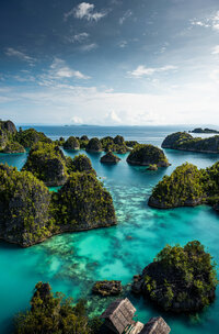 Southeast Asian holiday experiences - turquoise island seascapes, and cultural discovery.