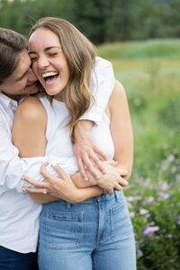 Couple hugs during Aspen engagement session. 