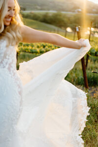 bride and groom kissing under veil