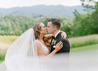 Bride and Groom Kissing at Their Asheville North Carolina Wedding Photo