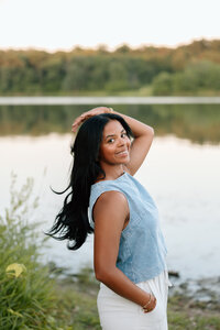 couple holds each others faces during engagement photos