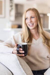 Tropical San Diego backyard with pool, wooden lounge chairs, and umbrella — lifestyle imagery for Mary Pernicano Real Estate and investor-focused services.