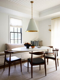 Hingham interior desigern brings modern furniture to a historic home, blending contemporary style with classic architecture for a timeless look.