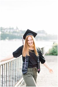 Senior guy smiles with arms crossed for Hamilton Montana senior pictures